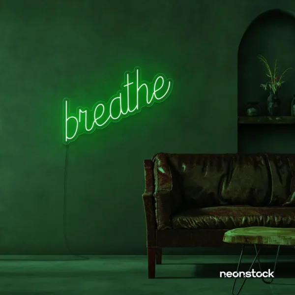 Breathe neon sign in deep green for meditation rooms, yoga studios, and calming home decor.