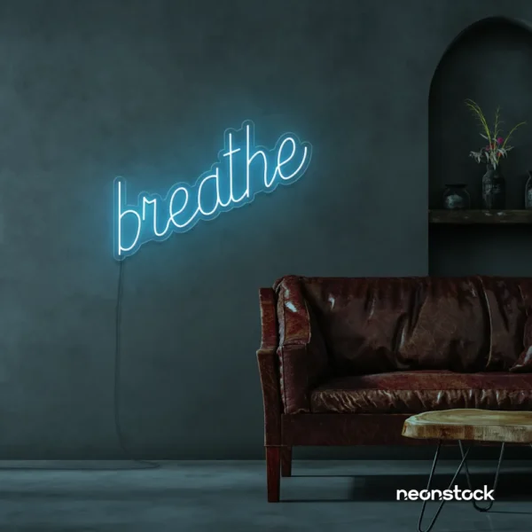 Breathe neon sign in ice blue for meditation rooms, yoga studios, and calming home decor.