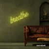 Breathe neon sign in lemon yellow for meditation rooms, yoga studios, and calming home decor.
