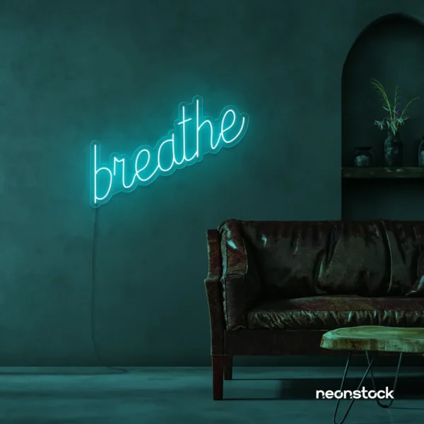 Breathe neon sign in mint green for meditation rooms, yoga studios, and calming home decor.