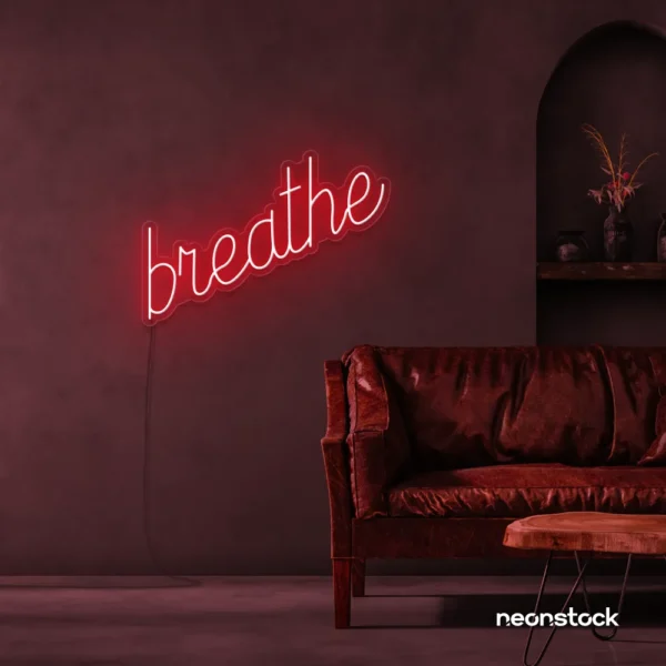 Breathe neon sign in red for meditation rooms, yoga studios, and calming home decor.