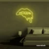 Drip lip neon sign in lemon yellow for glam rooms, modern wall art, and beauty salon decor.