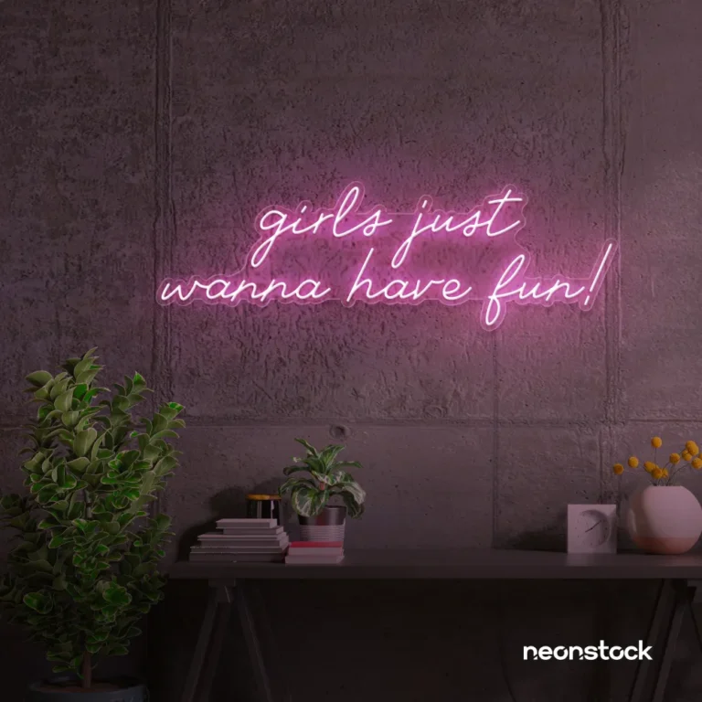 Girls Just Wanna Have Fun neon sign in baby pink for teen rooms, dorm decor, and party walls.