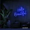 Hello Beautiful neon sign in dark blue script font for salon styling walls and glam vanity decor.