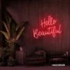 Hello Beautiful neon sign in red script font for salon styling walls and glam vanity decor.