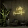 Hello Beautiful neon sign in warm white script font for salon styling walls and glam vanity decor.