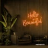 Hello Beautiful neon sign in orange script font for salon styling walls and glam vanity decor.