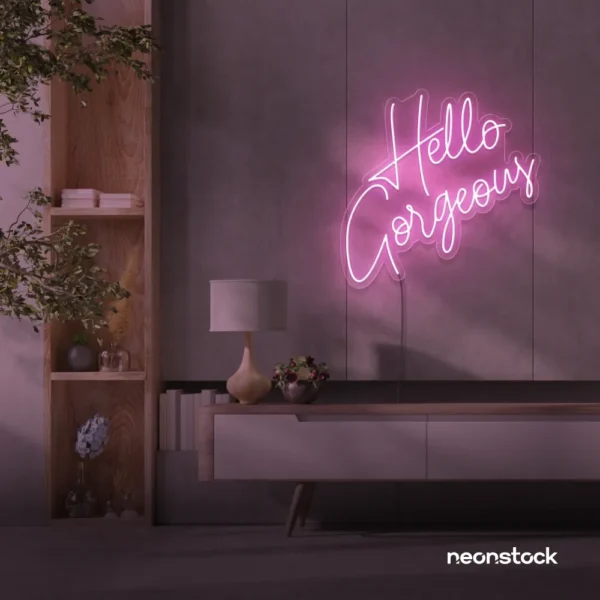 Hello Gorgeous neon sign (script font) in baby pink for salons, vanity walls, and glam rooms.