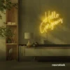 Hello Gorgeous neon sign (script font) in golden yellow for salons, vanity walls, and glam rooms.