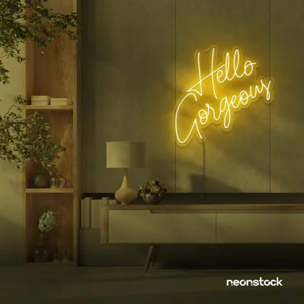 Hello Gorgeous neon sign (script font) in golden yellow for salons, vanity walls, and glam rooms.