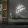 Hello Gorgeous neon sign (script font) in white for salons, vanity walls, and glam rooms.