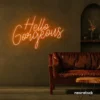 Hello Gorgeous neon sign in orange for beauty salons, home vanity walls, and glam room decor.