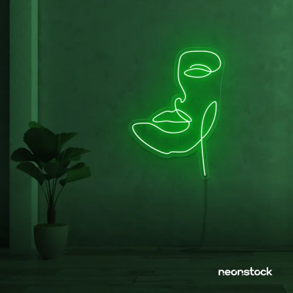 Abstract face neon sign in deep green for beauty salons, nail studios, and spa wall decor.