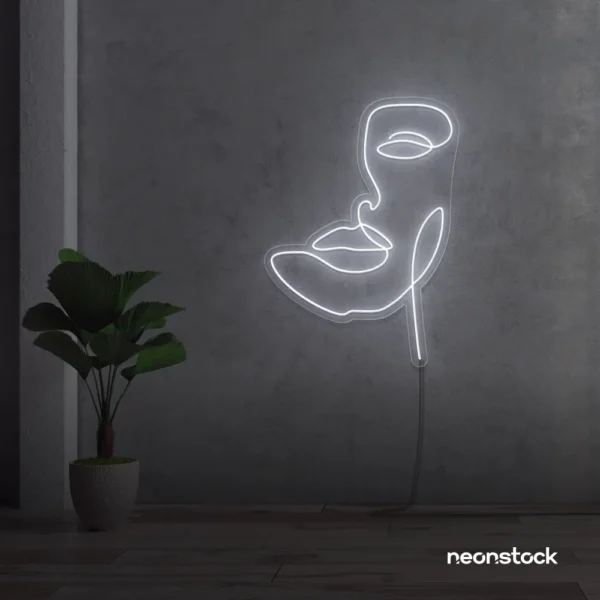 Abstract face neon sign in white for beauty salons, nail studios, and spa wall decor.