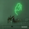 Abstract woman silhouette neon sign in green for salons, studios, and feminine wall decor.