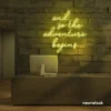 And So The Adventure Begins neon sign in lemon yellow for wedding decor, new beginnings, and celebration walls.