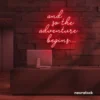 And So The Adventure Begins neon sign in red for wedding decor, new beginnings, and celebration walls.