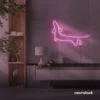 Dachshund dog neon sign in baby pink for pet decor and dog-themed wall art.