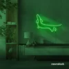 Dachshund dog neon sign in deep green for pet decor and dog-themed wall art.
