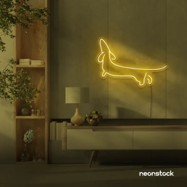 Dachshund dog neon sign in golden yellow for pet decor and dog-themed wall art.