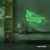 Dachshund dog neon sign in green for pet decor and dog-themed wall art.