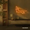 Dachshund dog neon sign in orange for pet decor and dog-themed wall art.