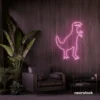 T-Rex dinosaur neon sign in baby pink for kids' bedrooms, dino-themed decor, and playroom walls.