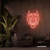 Dragon face neon sign in peachy pink – fierce LED wall light for fantasy and gaming decor.