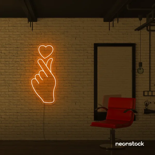 Finger heart neon sign in orange for bedroom and dorm room decor
