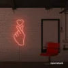 Finger heart neon sign in peachy pink for bedroom and dorm room decor