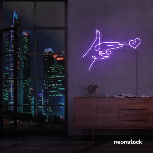 Hands shooting heart neon sign in purple – romantic LED wall decor.