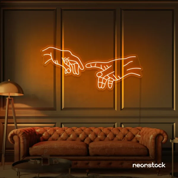 Hands neon sign in orange – modern wall art symbolizing connection and emotion.