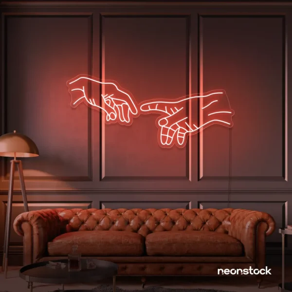 Hands neon sign in peachy pink – modern wall art symbolizing connection and emotion.