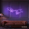 Hands neon sign in purple – modern wall art symbolizing connection and emotion.