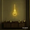 Hanging bulb neon sign in golden yellow for cafes, offices, and creative spaces.