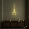 Hanging bulb neon sign in warm white for cafes, offices, and creative spaces.