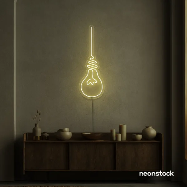 Hanging bulb neon sign in warm white for cafes, offices, and creative spaces.