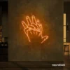 Holding hands neon sign in orange – emotional LED wall decor.