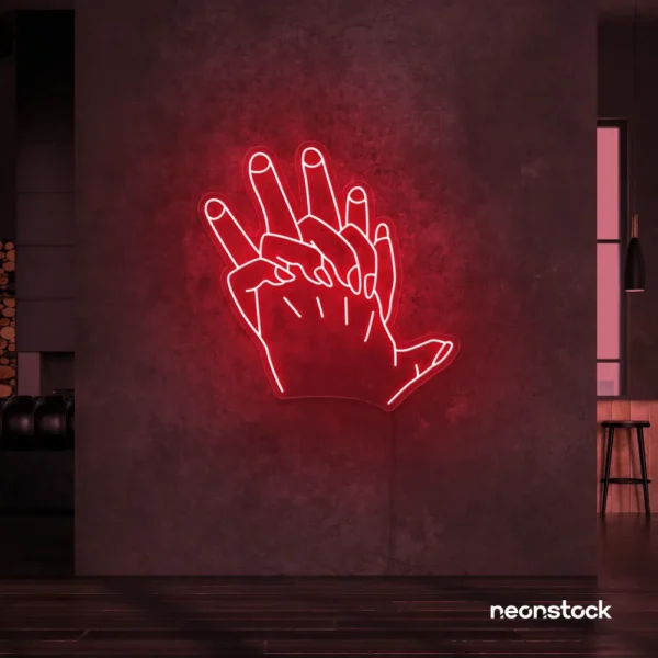 Holding hands neon sign in red – emotional LED wall decor.