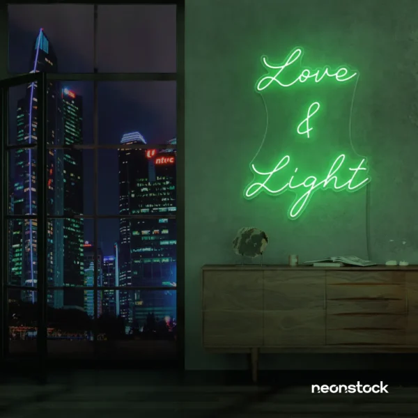 Love and Light neon sign in green for weddings, romantic decor, and celebration backdrops.