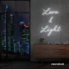 Love and Light neon sign in white for weddings, romantic decor, and celebration backdrops.