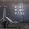 Puff Puff Pass neon sign in neutral white for man caves, smoking lounges, and garage walls.