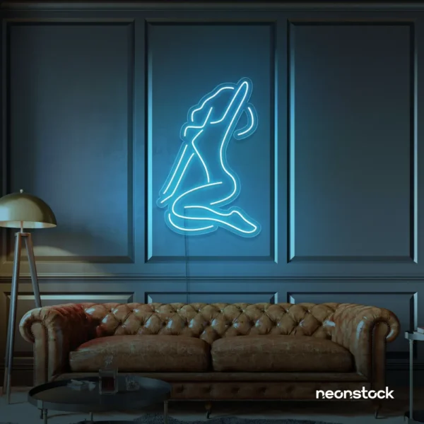 Sitting woman neon sign in ice blue for minimalist wall art and feminine home decor.