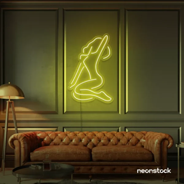 Sitting woman neon sign in lemon yellow for minimalist wall art and feminine home decor.