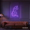Sitting woman neon sign in purple for minimalist wall art and feminine home decor.