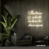 This Home Is Built on Love and Shenanigans neon sign in neutral white for family walls, living rooms, and cozy decor.
