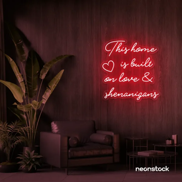 This Home Is Built on Love and Shenanigans neon sign in red for family walls, living rooms, and cozy decor.