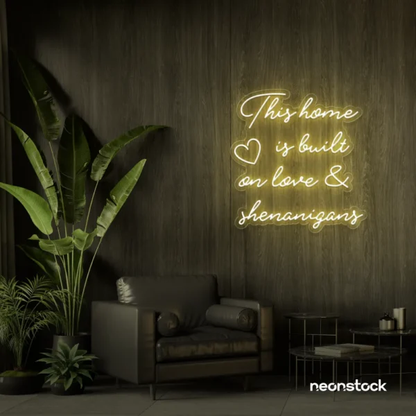 This Home Is Built on Love and Shenanigans neon sign in warm white for family walls, living rooms, and cozy decor.
