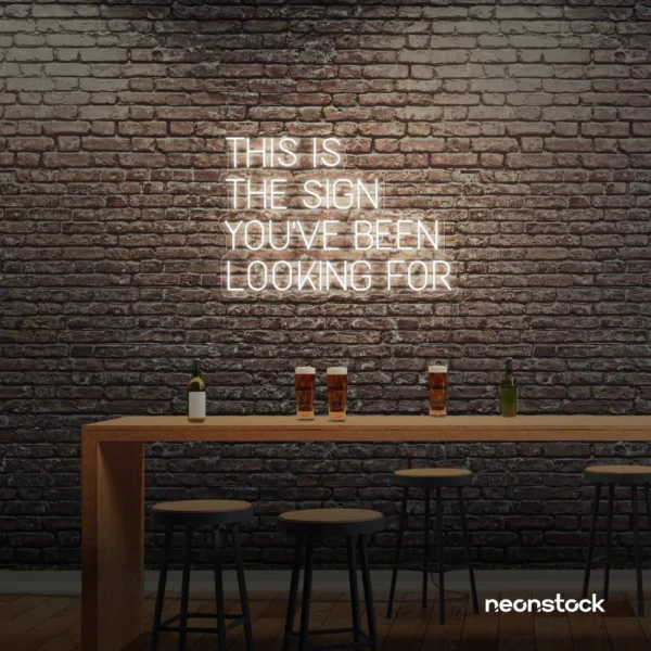 This Is The Sign You’ve Been Looking For neon sign in neutral white for modern wall decor and motivational rooms.