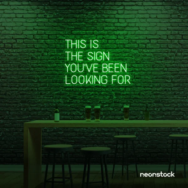 This Is The Sign You’ve Been Looking For neon sign in deep green for modern wall decor and motivational rooms.